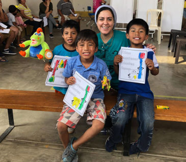 Doctor with little boys in peru