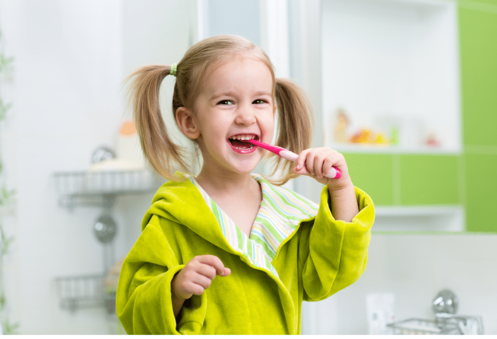 child brushing teeth