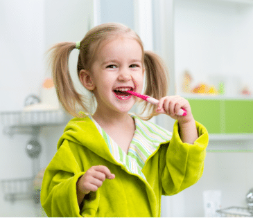 child brushing teeth
